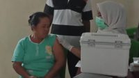 Dinkes Boltim dan Puskesmas Pacu Vaksinasi