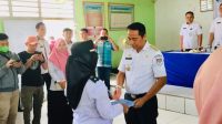 Desa Modayag Dua Miliki Pemimpin Baru Erni Mamonto Jabat Pjs Sangadi, Ini Pesan Bupati Boltim Penting Diketahui