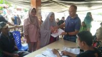 Dinsos Boltim dan PT. POS Kembali Salurkan BLT BBM  