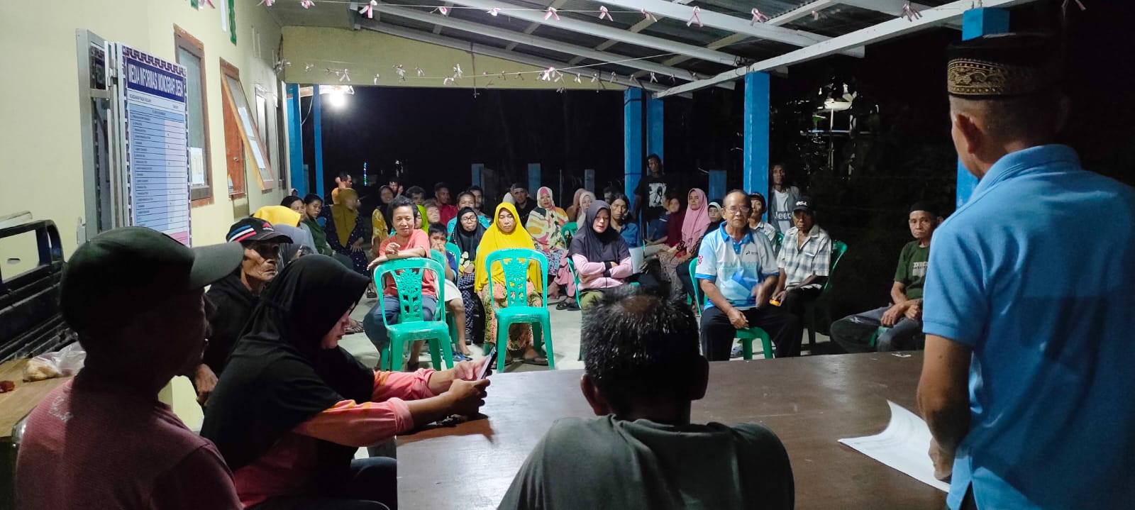 Kades Buyat Tengah Busran Modeong Salur BLT Berkah Ramadhan