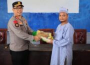 Respons Cepat Polres Boltim, Kapolres AKBP Golfried Hasiholan Pakpahan Serahkan Bansos kepada 60 KK Korban Banjir Desa Paret